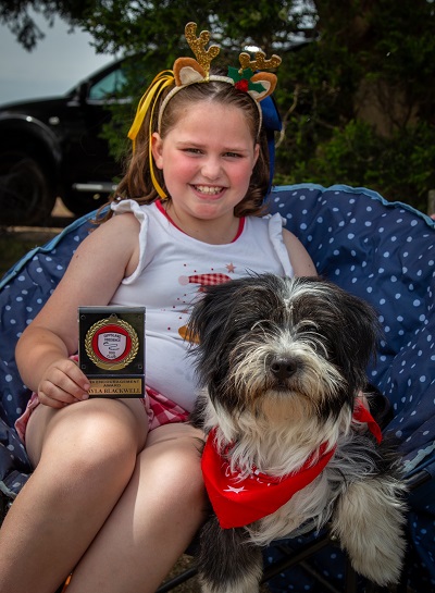 Layla with Maggie and her award